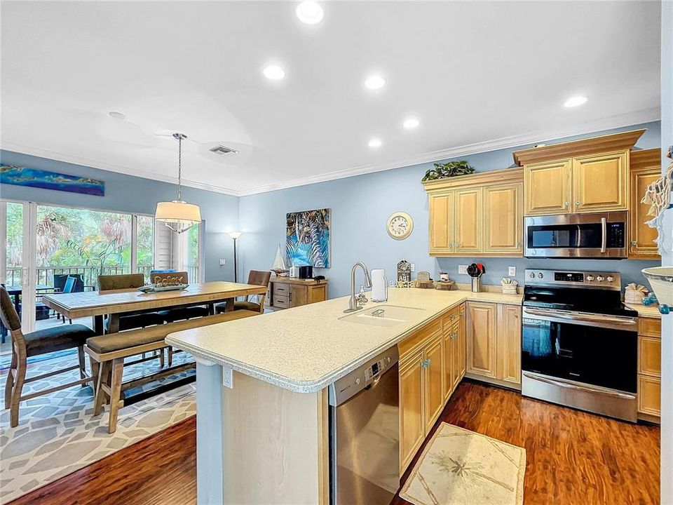 Open concept kitchen with adjacent dining area