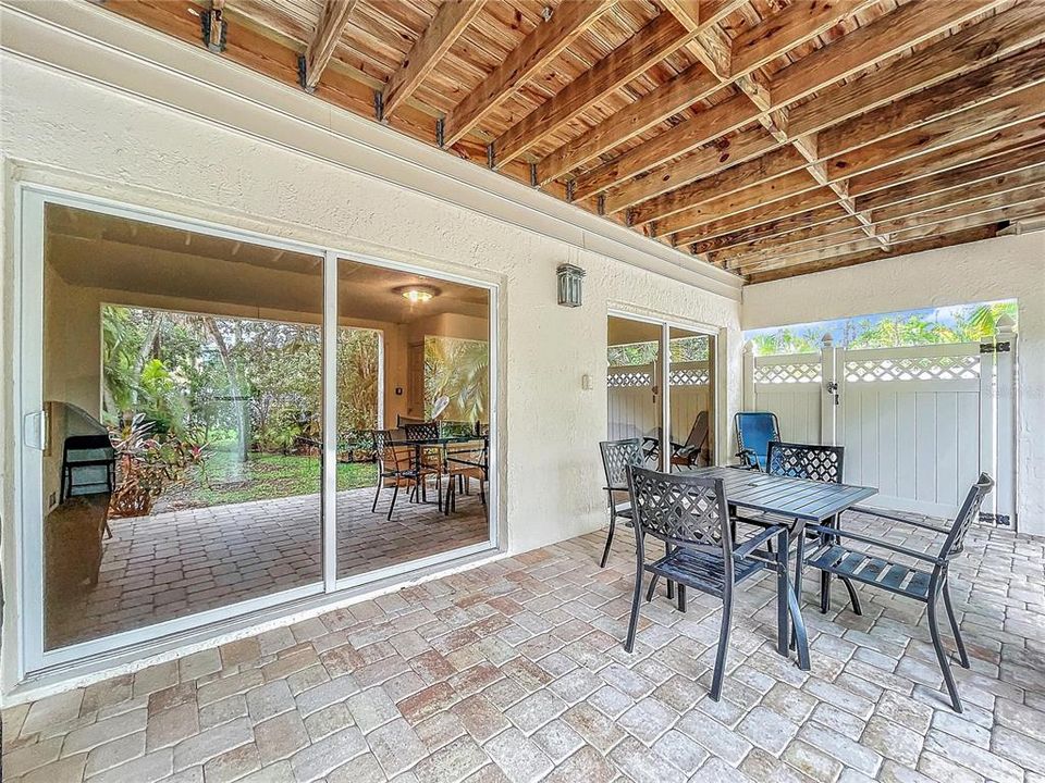 Ground level covered patio just beyond the recreation room