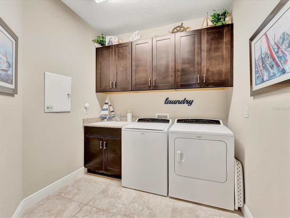 Laundry Room with built in cabinets