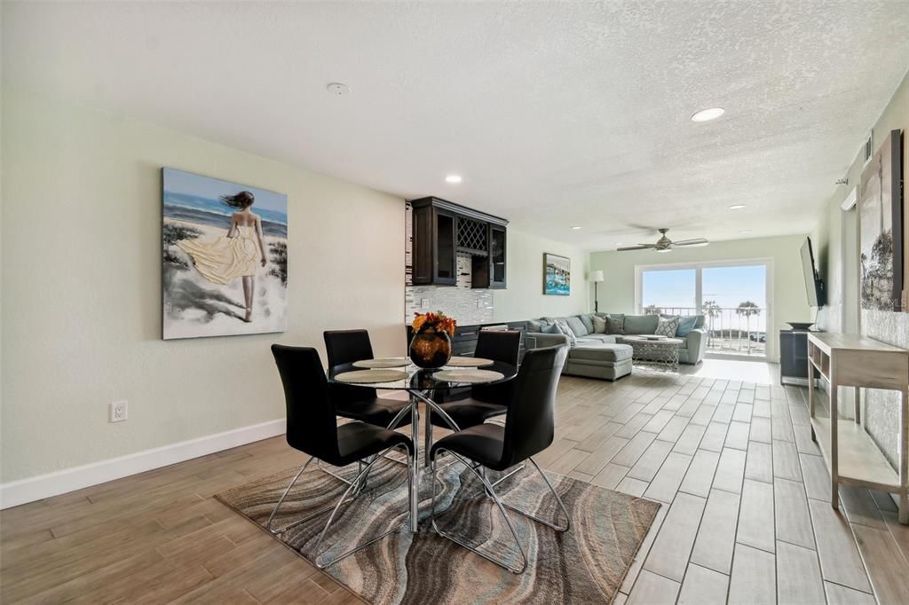 The open floor plan is well appointed with stylish furnishings, sold completely turnkey.