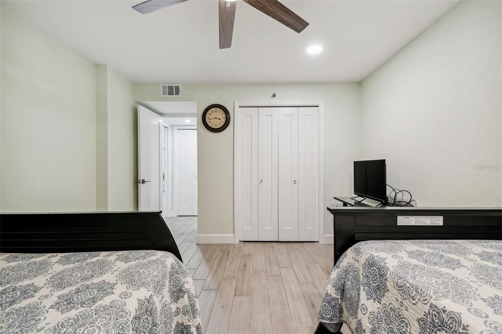 The 2nd bedroom offers ample space for guests, with a split plan for privacy