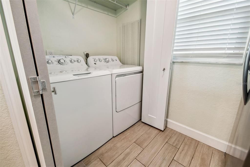 The in-unit laundry closet offers both convenience and privacy. Who wants to go to the laundry room? Not us...