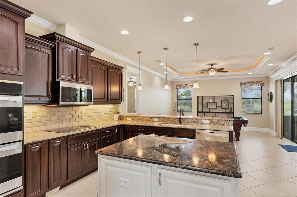 Modern kitchen showcasing a central island for culinary convenience