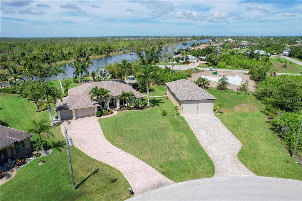 Stunning aerial perspective of an extensive double corner lot