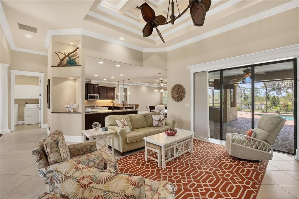 Open great room with contemporary tile flooring