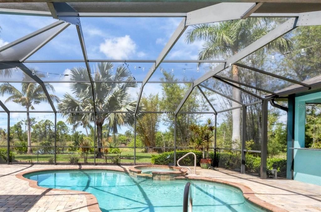 heated pool with breathtaking water views and child-safety gate available