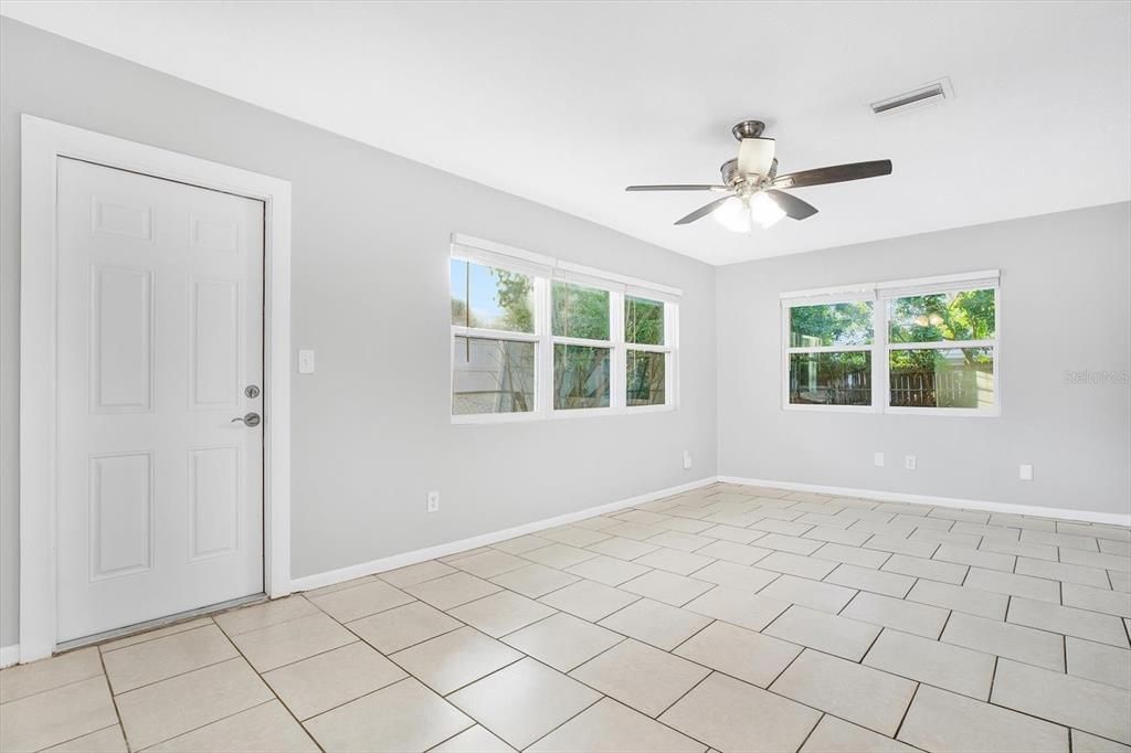 Virtually staged photo - bonus room/family room/formal dining