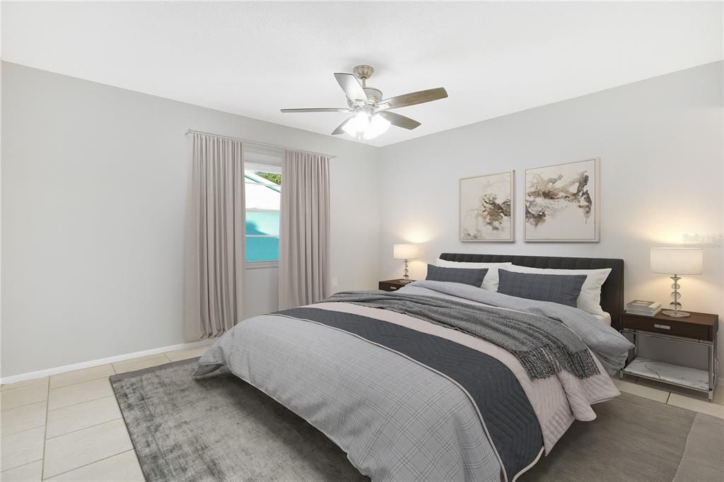 Virtually staged photo - primary bedroom with walk-in closet and ensuite bathroom