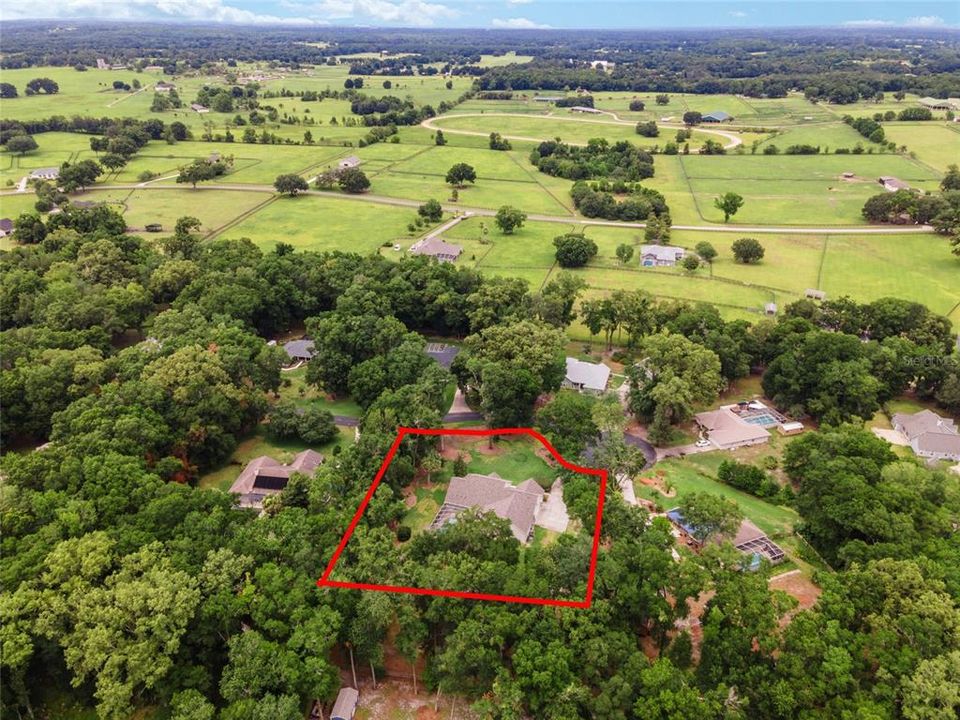 Aerial of lot, back ground shows the horse farms of Ocala Downs.