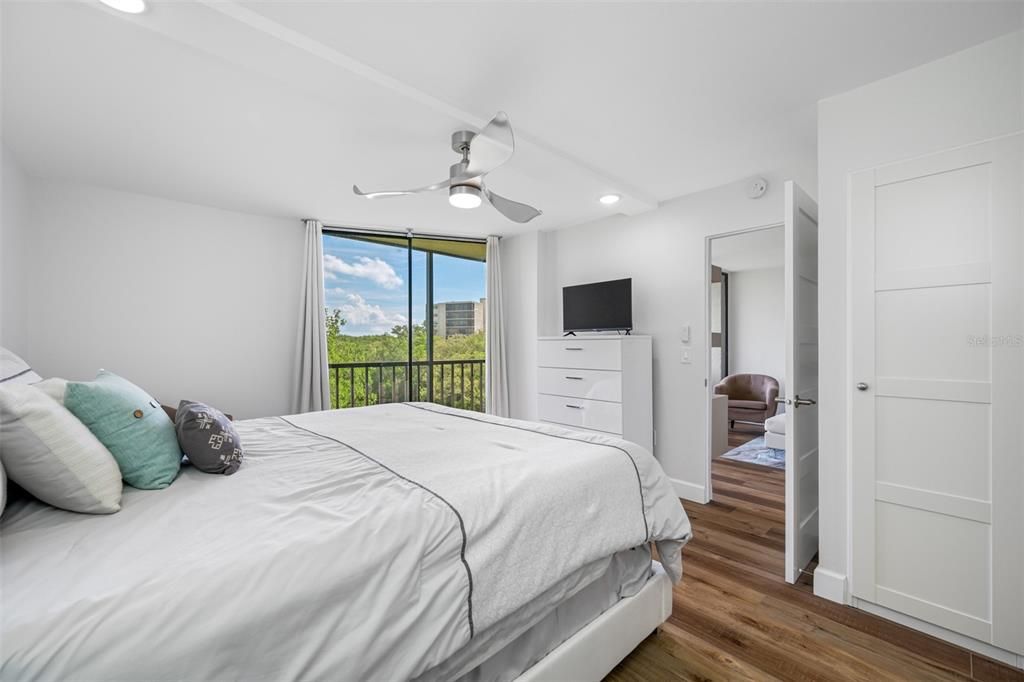 Master bedroom with lanai access of master bedroom sliding doors.