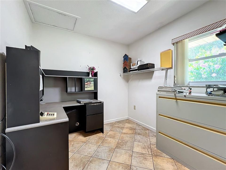 Full guest bathroom off of laundry just inside separate entrance.