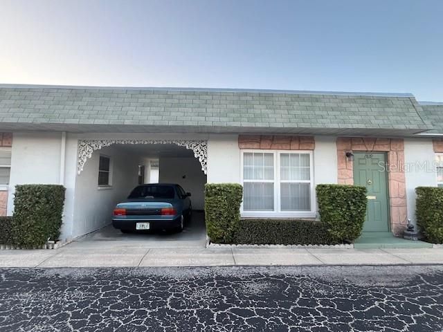 Front view with the carport