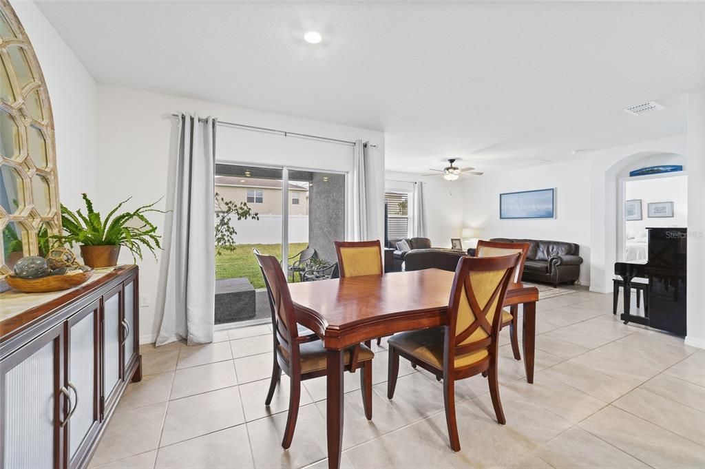 Open dining area looks out on rear garden.