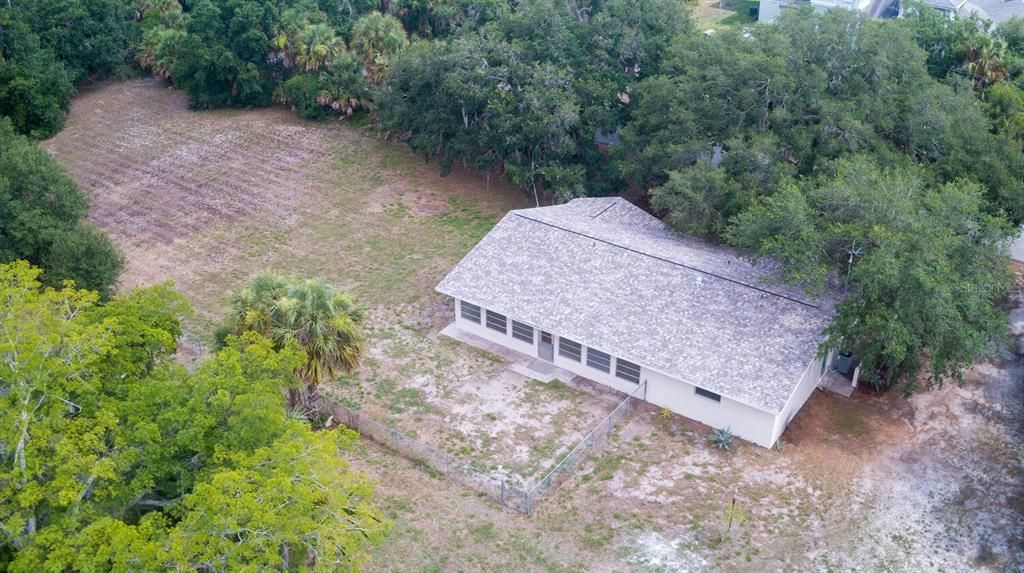 Note new roof and west side yard