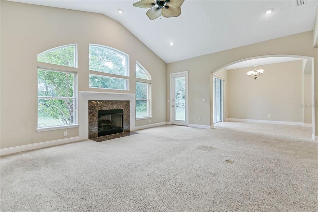 Beautiful gas fireplace with surround windows