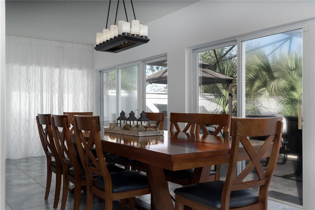 Florida room dining with pool view