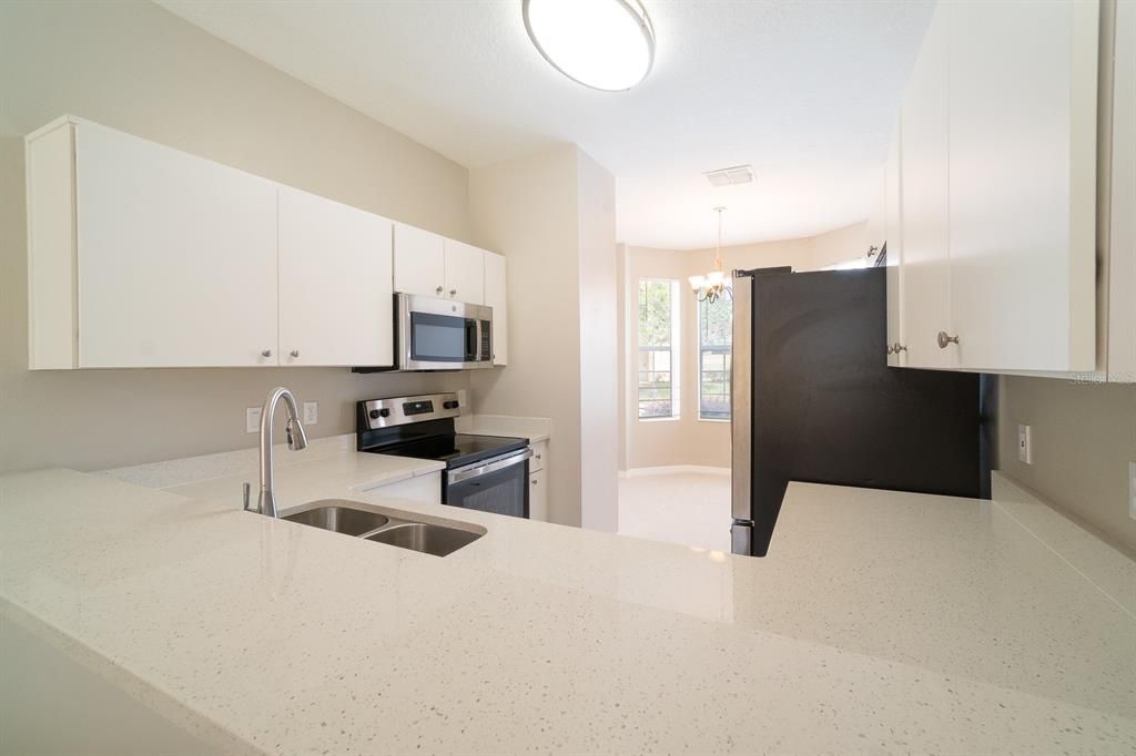 kitchen has quartz countertops