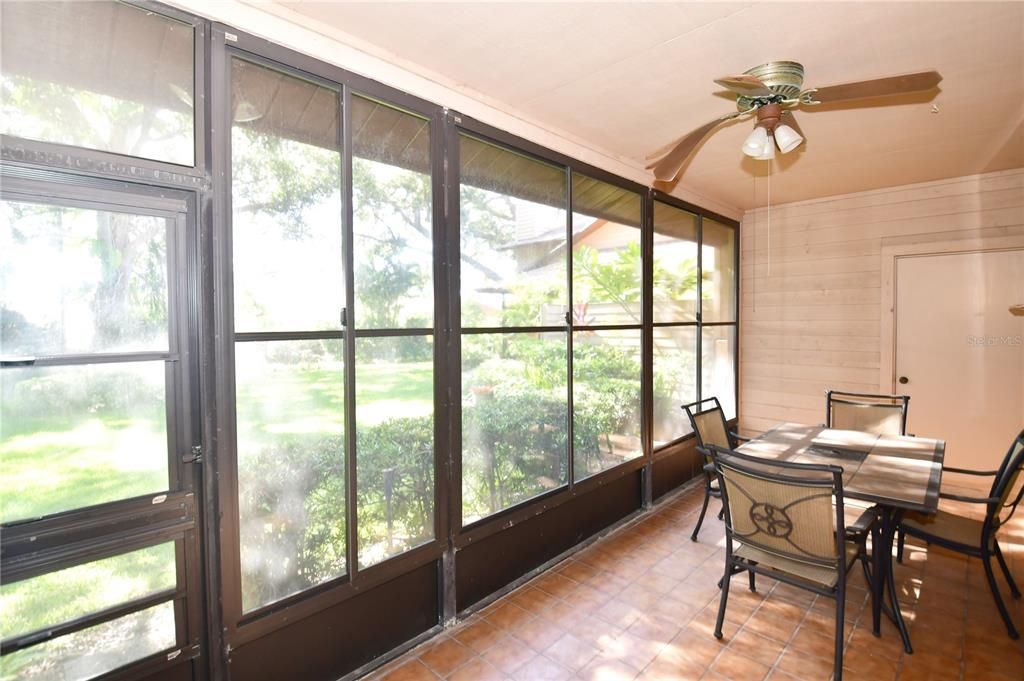 enclosed patio with storage closet