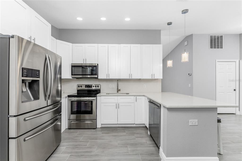 Recessed lighting and ample cabinet space