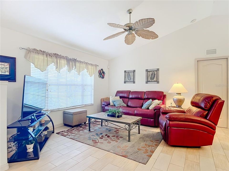 Bright Living room with a vaulted ceiling