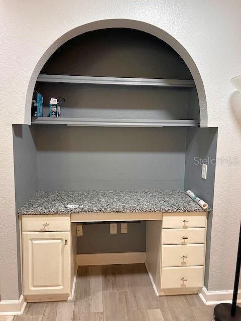 Built-in desk off of kitchen