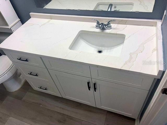 Brand new solid wood vanity with quartz countertop