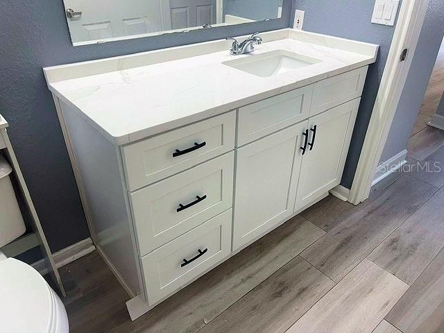 Brand new solid wood vanity with quartz countertop