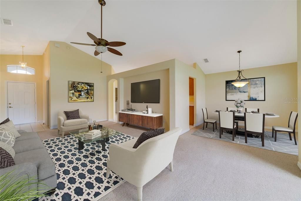 Highlights of this home include; both the front and rear porches are screened, the PRIMARY SUITE has DUAL CLOSETS and the flowing floor plan delivers HIGH CEILINGS and plenty of natural light. Virtually Staged.