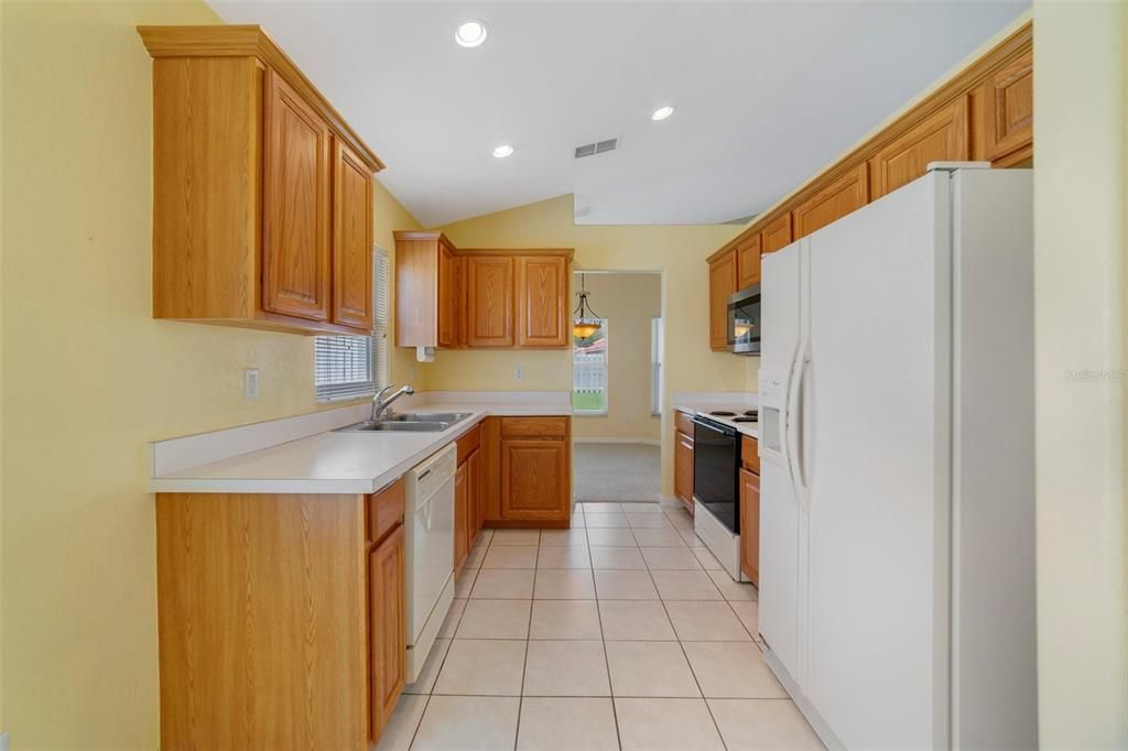 And the home chef will appreciate the ample cabinet storage, recessed lighting, window over the sink and the breakfast nook gives you additional casual dining space.