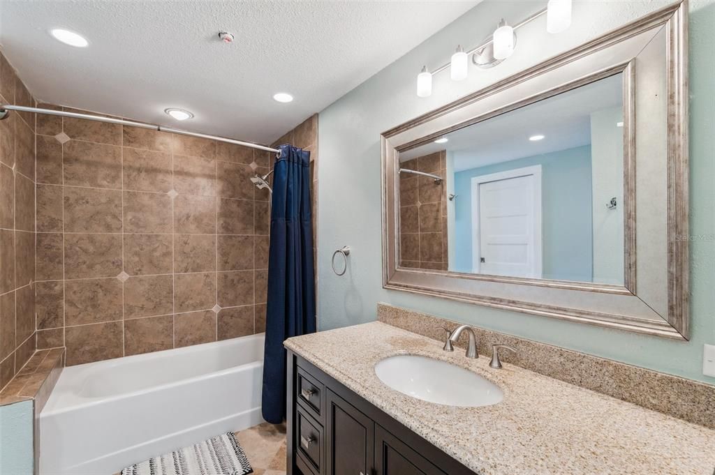 Second full bathroom with nice tub!