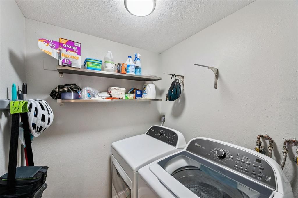 Washer and dryer inside the unit next to the kitchen !