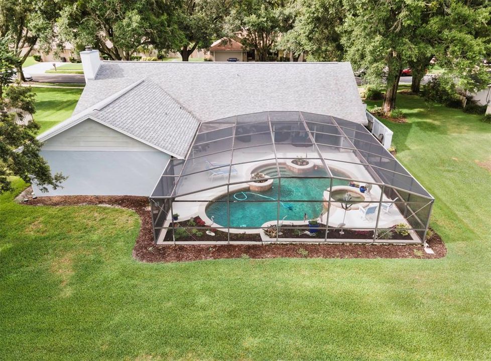 View of pool from the back of house