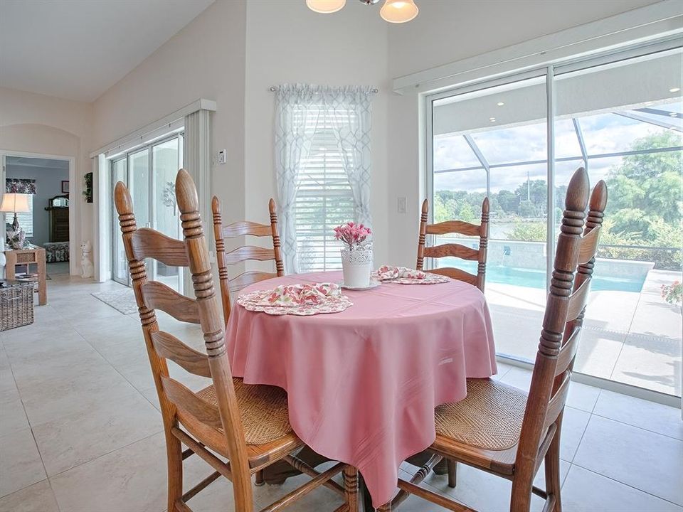 SLIDING GLASS DOORS OFF OF DINETTE LEAD YOU OUT ONTO THE LANAI