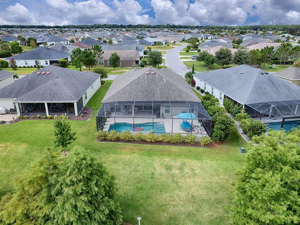 AERIAL PHOTO OF THIS LOVELY IRIS PLAN POOL HOME