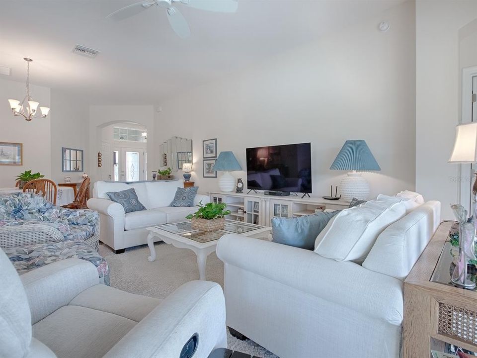 FAMILY ROOM IS SO COMFORTABLE & HAS PLENTY OF WALL SPACE TO MAKE FURNITURE PLACEMENT EASY