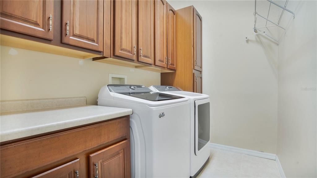 Indoor Laundry Room with much storage