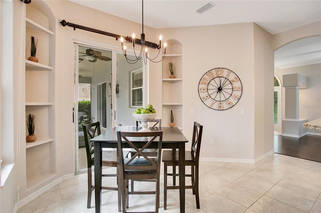 Dinette with Built-In Shelves and Slider leading to Lanai