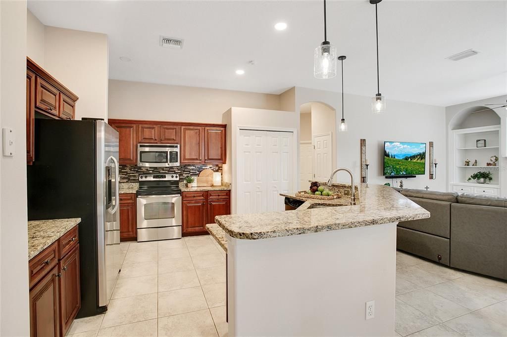 Large Open Kitchen overlooking backyard with Pool