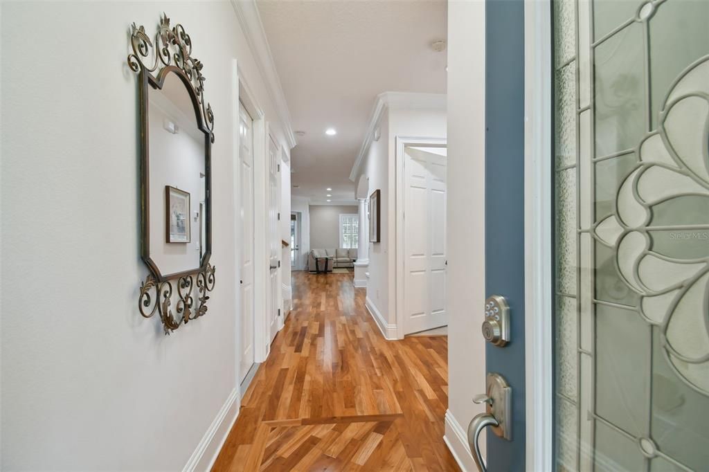 Entry hallway showcasing beautiful hardwood floors