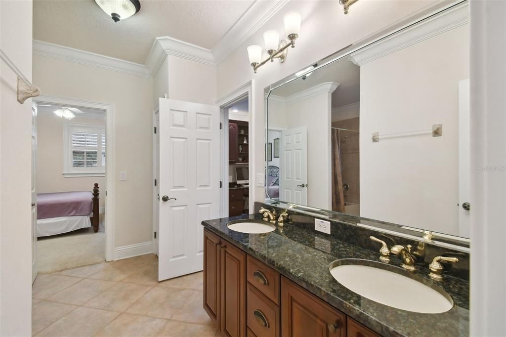 Upstairs bathroom with dual sinks