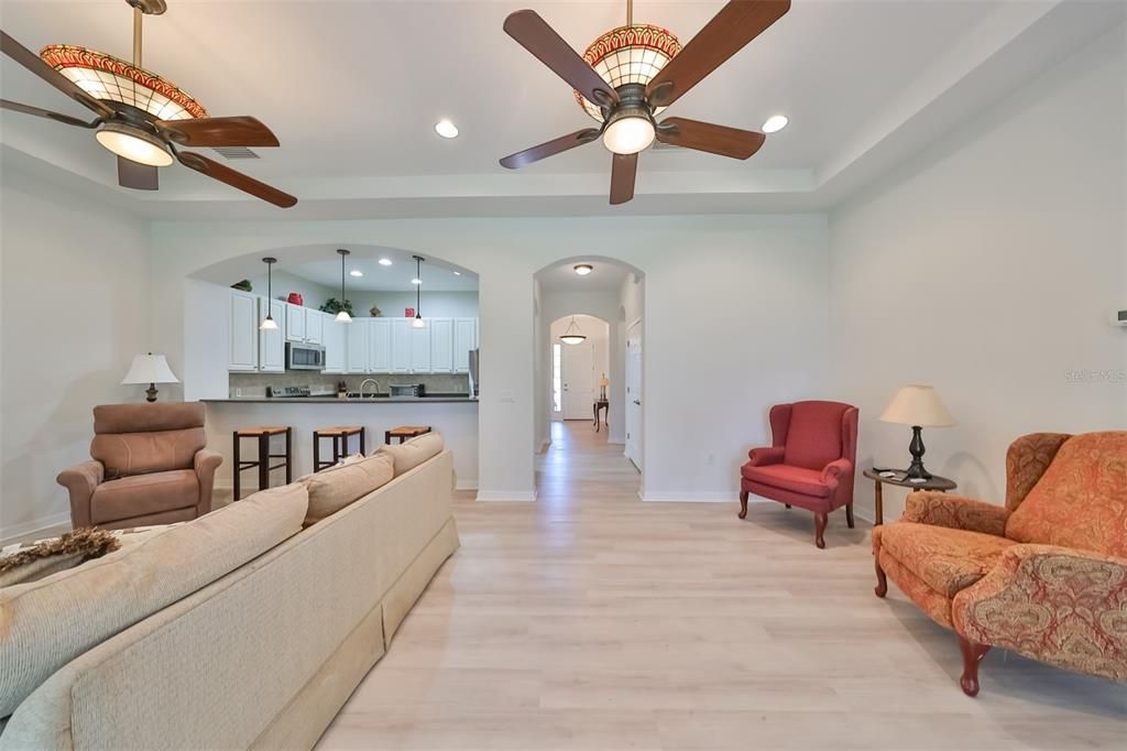 Looking from the Lanai into Great Room, then hallway leading to the front door.