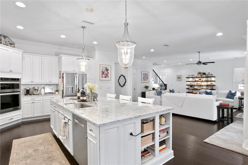 The first-floor living is inviting and captivating with a Chef’s delight eat-in kitchen with oversized island for friends and family to gather and seamlessly flows into the family living room