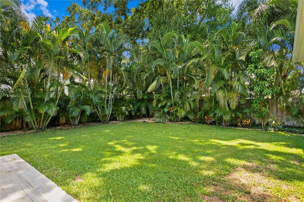 This home sits on a large lot where the backyard encompasses both a pool and greenery for a soccer net, playset, or space for our furry family members to play.