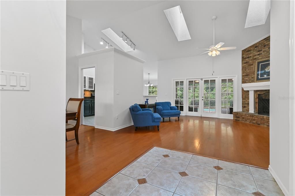 When you enter the home, you will notice the high ceilings in the family room with a wood burning fireplace.  The skylights will help provide additional natural lighting to save on turning on lights.