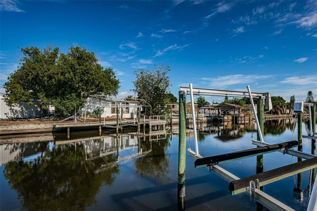 Boat lift to store your boat, right in your backyard.