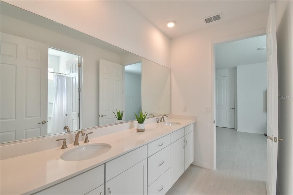 Dual vanities in the Jack/Jill bathroom