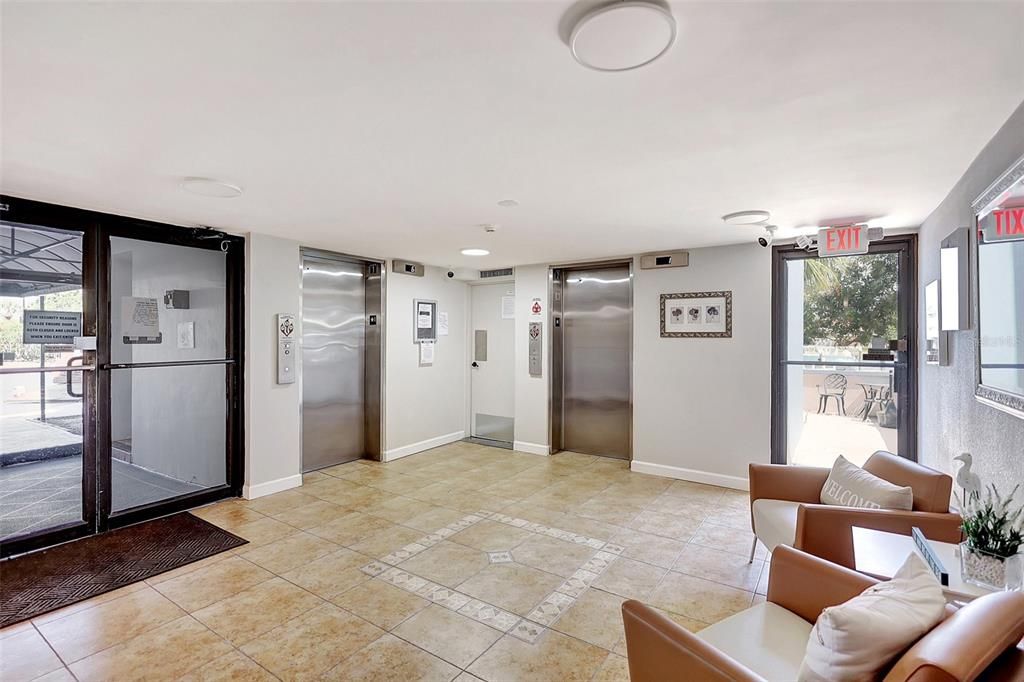 Enter into the reception area of this condo, designed to greet you with warmth and functionality.