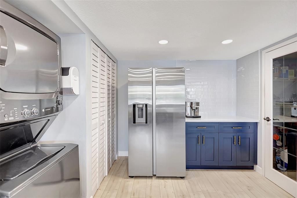 It also features a convenient pantry for extra storage, along with an additional countertop space for preparing meals or setting up a cozy coffee station.