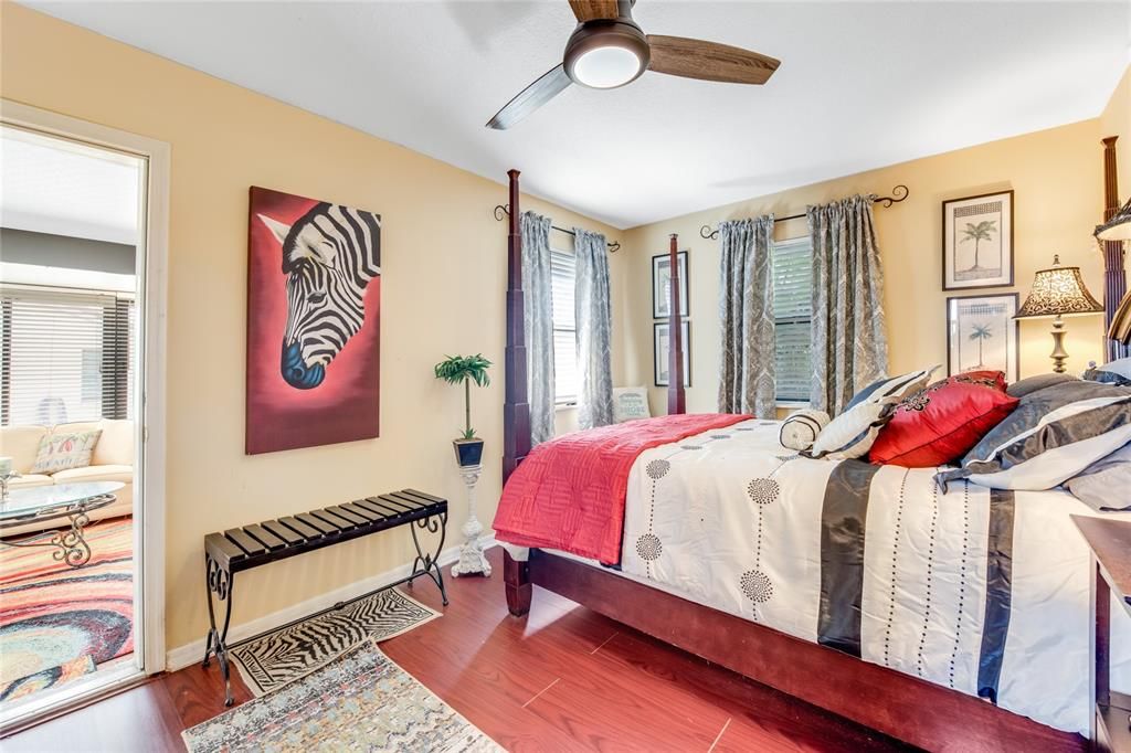 Bedroom open to the Glassed in Family Room!