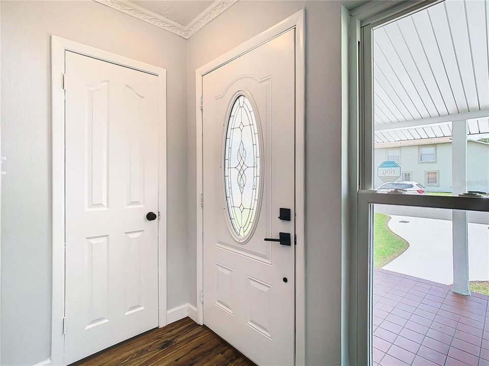 Entry way coat closet.